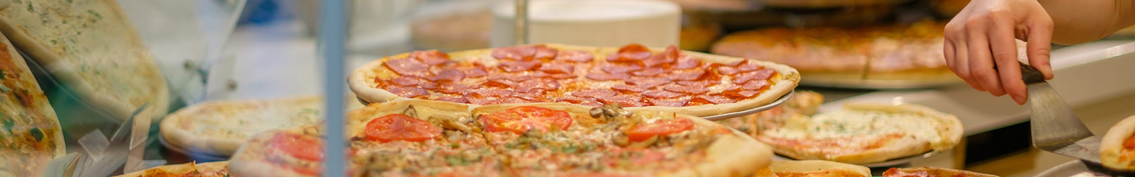 Variety of pizzas on display for sale